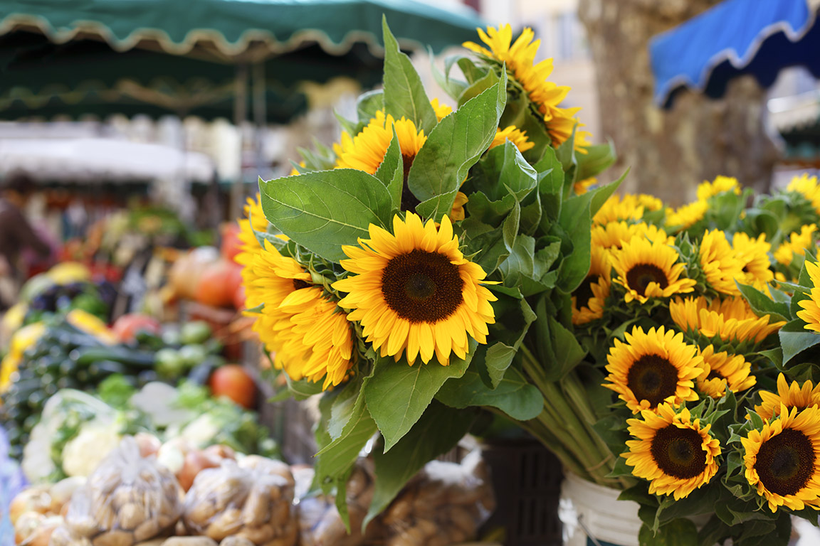 Farmers market with sunflowers